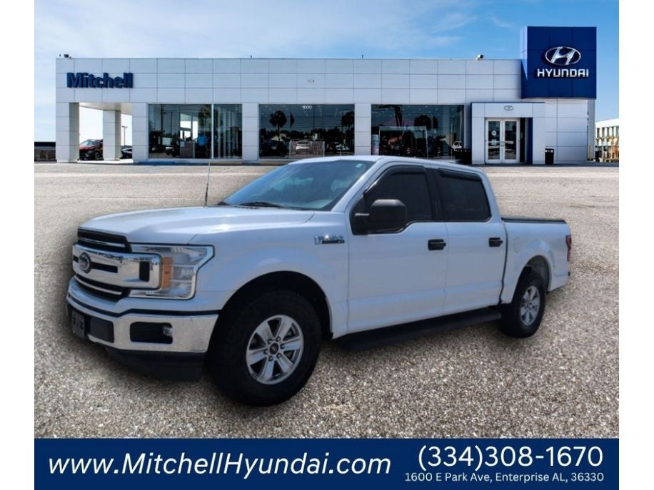 2018 Ford F-150 XLT in Oxford White — front three-quarter view