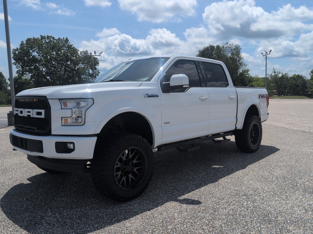 2016 Ford F-150 Lariat in Oxford White — front three-quarter view