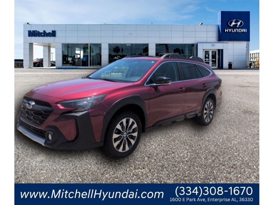 2023 Subaru Outback Limited in Crimson Red Pearl — front three-quarter view