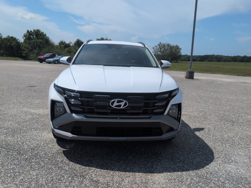 2026 Hyundai TUCSON SEL Premium in Serenity White Pearl — front three-quarter view